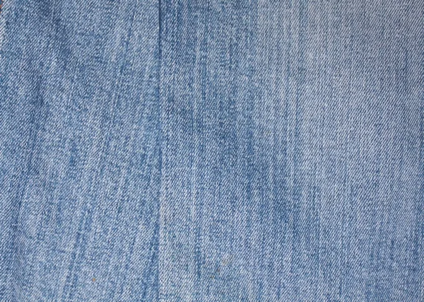 Textur av blå jeans textil närbild — Stockfoto