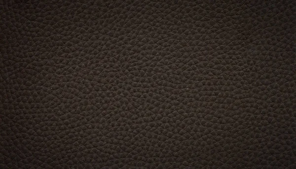 En bild av en fin läder bakgrund. Kohud textur. — Stockfoto