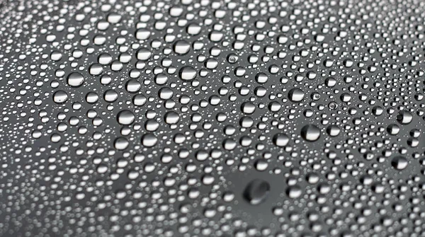 Gros plan condensation d'eau sur fond de verre de fenêtre . — Photo