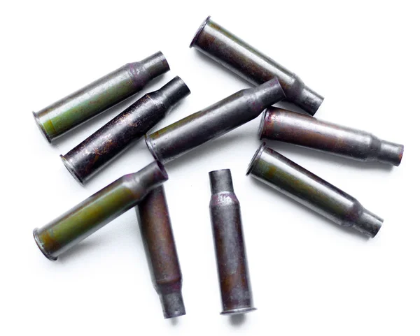 A pile bullet shells on a white background — Stock Photo, Image