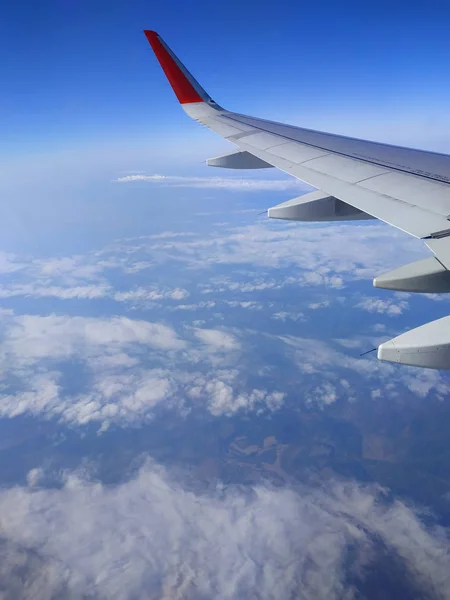 Beautiful view of airplane wing on blue sky background — Stock Photo, Image