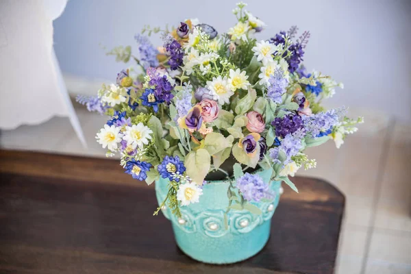 Blue flower vase on the table
