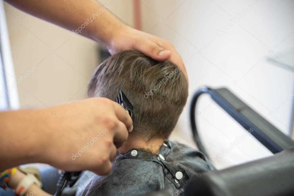 Cute baby boy toddler - cutting hair