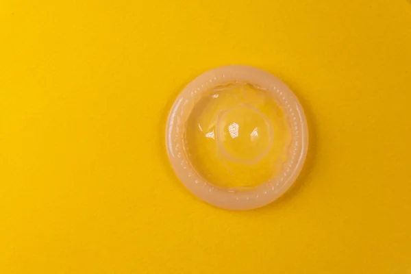 Latex Condom Yellow Background — Stock Photo, Image