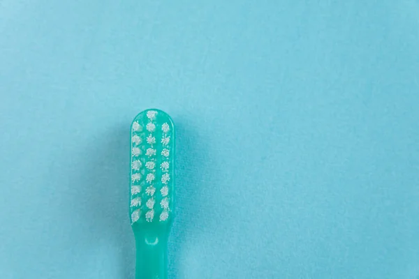 Green Toothbrush Blue Background — Stock Photo, Image