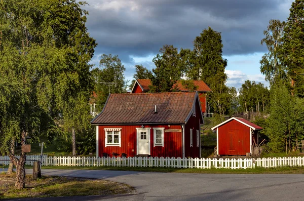 View of small, red Swedish houses in the swedish village Herraeng — Stock Photo, Image
