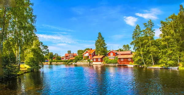 Typical Red Swedish Houses Pond Royalty Free Stock Images