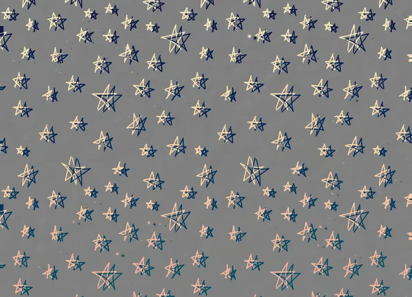 Ein grauer Hintergrund mit Kritzelsternen, Sternenhintergrund — Stockfoto