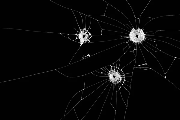 Три Пулевых Отверстия Разбитом Стекле Изолированы Черном Фоне Разбитые Окна — стоковое фото