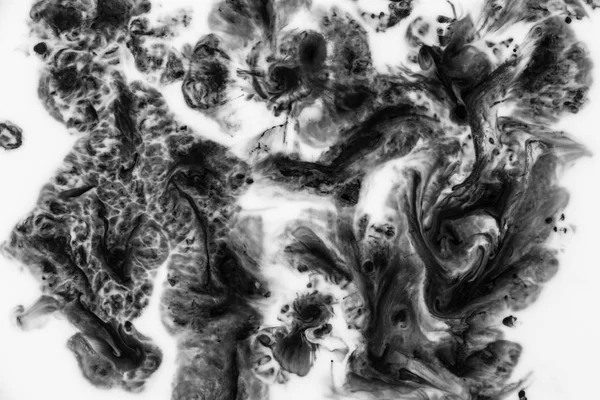 Black and white liquid ink swirl abstract background
