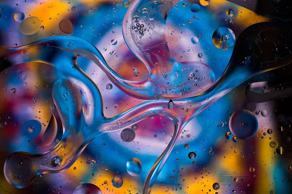五颜六色的液体抽象纹理漩涡背景 水溅起 宏观摄影 — 图库照片