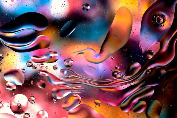Colorful liquid abstract textured swirls background. Water splash. Macro photography