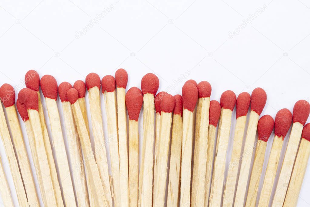 Red matches isolated on white background