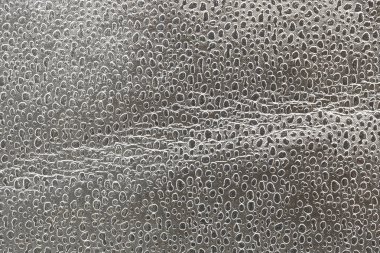 Gümüş buruşmuş yansıtıcı dokusu veya arkaplanı
