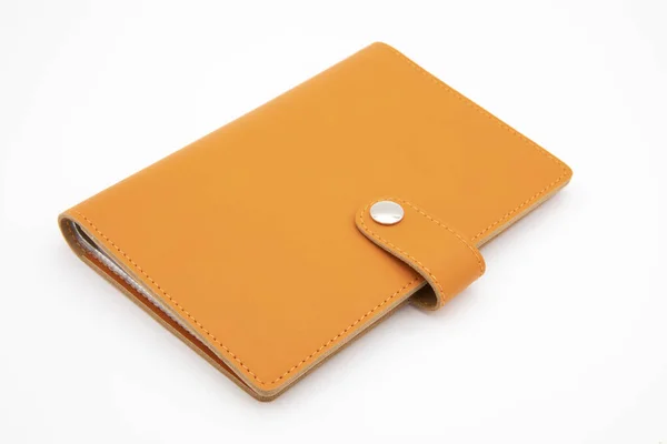 白色背景的橙色笔记本 — 图库照片