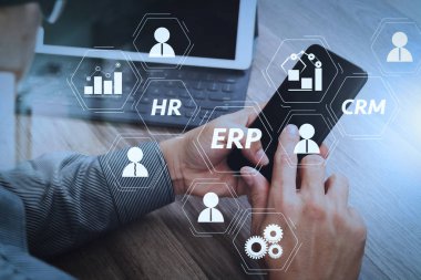 İş Zekası (BI), üretim, Crm modülleri ve İK diyagramı arasındaki bağlantıları ile Erp (Kurumsal Kaynak Planlaması) sistem mimarisi. Mobil ödeme online alışveriş kullanarak ele.