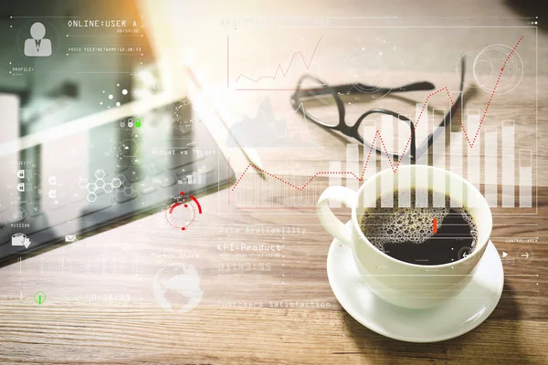 Intelligence (BI) and business analytics (BA) with key performance indicators (KPI) dashboard concept.Coffee cup and Digital table dock smart keyboard,eyeglasses,stylus pen on wooden table