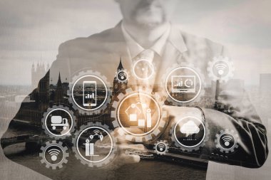 Technology.success işadamı holding boyun bulut ile şeylerin (çok) Internet veri alış verişi akıllı fabrika ve sanayi 4.0 ve bağlı üretim robotlar Londra bina ile kravat.