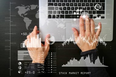 Investor analyzing stock market report and financial dashboard with business intelligence (BI), with key performance indicators (KPI).cyber security internet and networking concept.Businessman hand working with laptop computer
