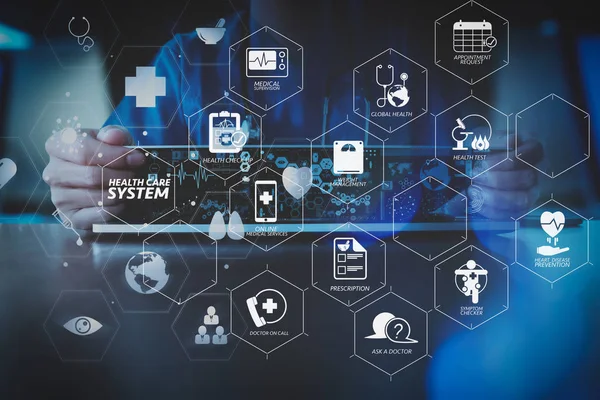 Health care system diagram with health check and symptom on VR dashboard.smart doctor hand working with modern laptop computer in modern office with virtual icon diagram