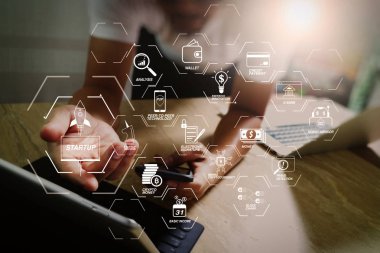Finans Teknolojileri akış çizelgesi ve temel gelir araştırma cryptocurrency blockchain başlangıç tek boynuzlu at kripto para sanal diagram.designer akıllı telefon ve klavye kullanarak ile dijital tablet dock.