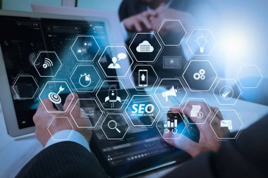 Mobil Web sitesi ve açılış sayfası sanal diyagramı ile Web sitesi için SEO optimizasyonu. İş takım toplantısı mevcut. Fotoğraf profesyonel yatırımcı yeni başlangıç projesi ile çalışma. Finans Yöneticileri Toplantısı.