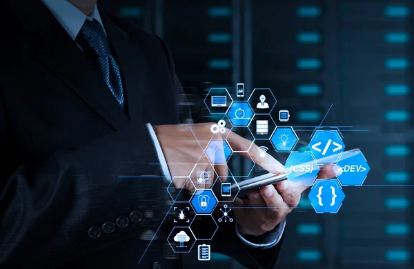 Coding software developer work with augmented reality dashboard computer icons of scrum agile development and code fork and versioning with responsive cybersecurity.businessman hand using tablet computer.