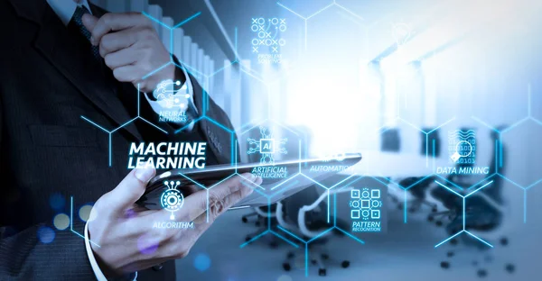 Machine learning technology diagram with artificial intelligence (AI),neural network,automation,data mining in VR screen.Businessman hand working with a digital tablet on meeting room background