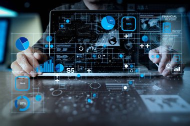 Mali rapor veri Fintech concept.business adam olarak iş işlemleri (bilanço ve gelir tablosu ve diyagram) dijital katman iş stratejisi ile dizüstü bilgisayar üzerinde çalışan el.