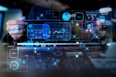 Mali rapor veri Fintech concept.business adam olarak iş işlemleri (bilanço ve gelir tablosu ve diyagram) dijital katman iş stratejisi ile dizüstü bilgisayar üzerinde çalışan el.