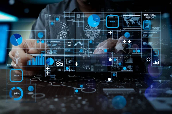 Financial report data of business operations (balance sheet and income statement and diagram) as Fintech concept.Medicine doctor hand working with modern computer interface as medical network concept