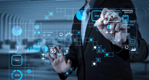 Financial report data of business operations (balance sheet and income statement and diagram) as Fintech concept.businessman hand writing in the whiteboard or virtual screen