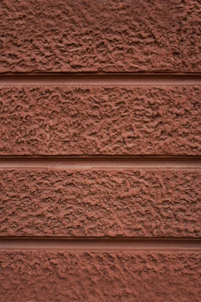 Parede textura de concreto avermelhado . — Fotografia de Stock