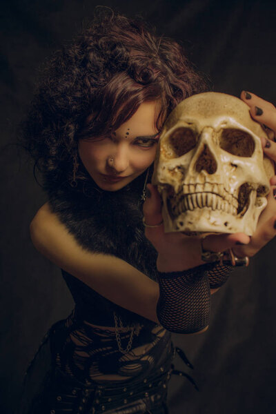 Fashionable kawaii witch with skull