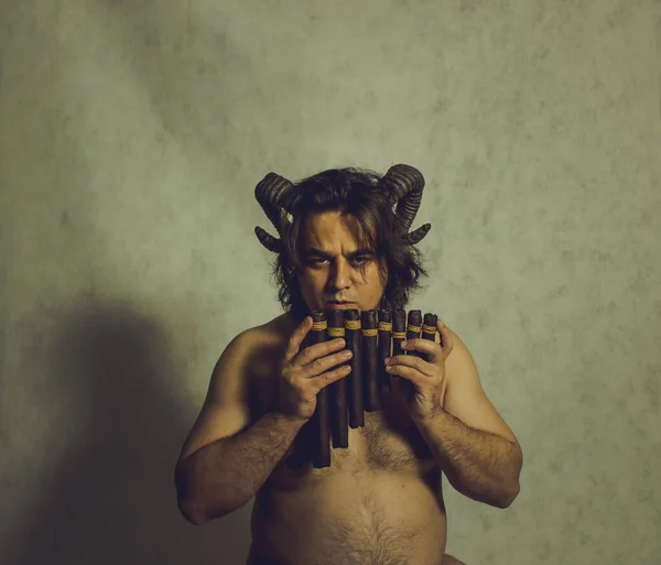 Horned Faun Playing Wooden Panflute — Stock Photo, Image