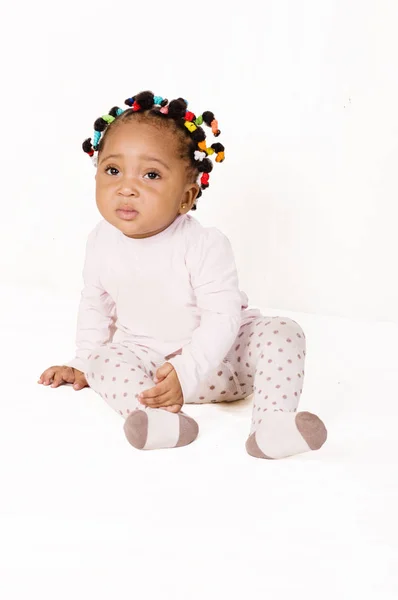 Portrait Nice Baby Sitting Looking Camera White Background — Stock Photo, Image