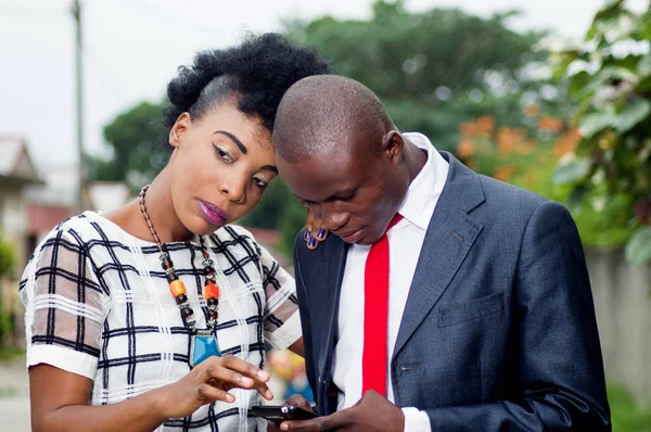 Young Woman Touches Screen Mobile Phone His Colleague — Stock Photo, Image