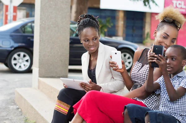 Smiling Young Businesswomen Sharing Boxes Milk Tablet — Stock Photo, Image