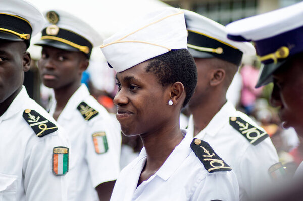 Abidjan, Ivory Coast - August 3, 2017: shoulder pad ceremony for students leaving the Maritime Academy. a group of young sailors dressed in blankets waiting for their diplomas.
