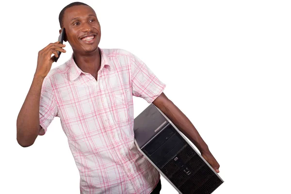 Jeune technicien avec ordinateur dans les mains — Photo