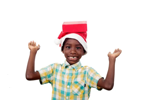 Kleine jongen met zijn kerstcadeau. — Stockfoto