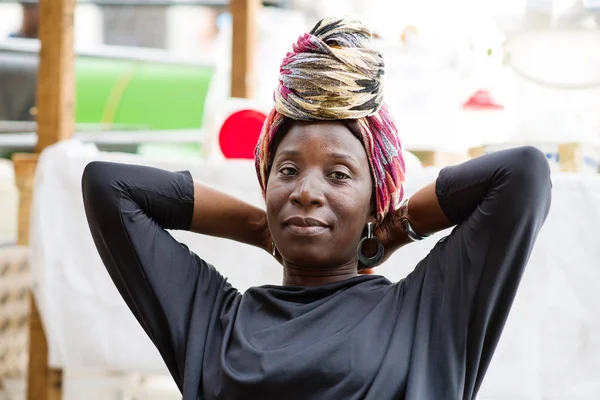 Portrait of african woman wearing head scarf — Stock Photo, Image