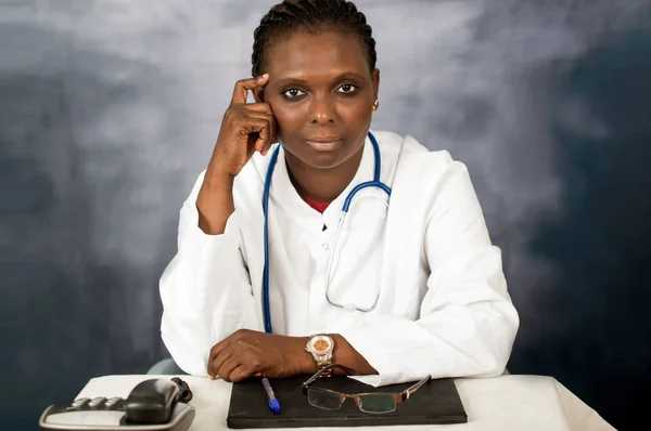 Portrait of young female doctor in the office. — Stock Photo, Image