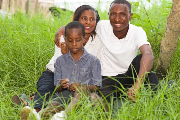 Portrait of Families smiling in park — Stock Photo, Image