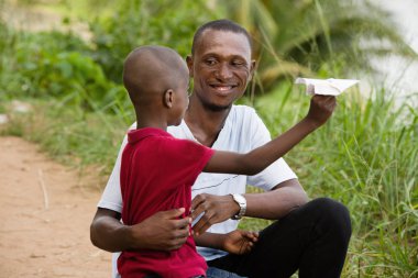 Küçük bir çocuk ve babası portre.