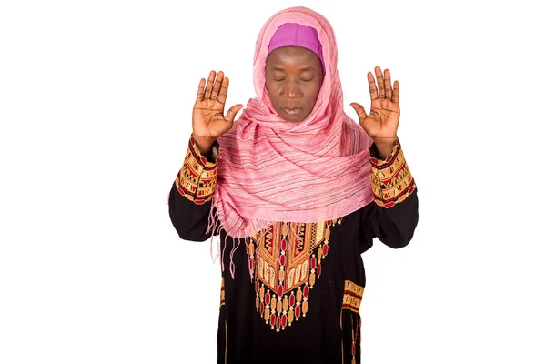 Beautiful young woman praying on white background — Stock Photo, Image