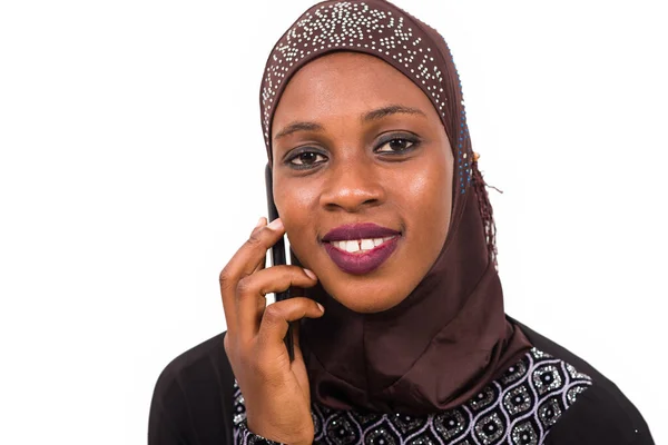 Young Muslim Woman Sitting Interacting Mobile Phone While Smiling — Stock Photo, Image