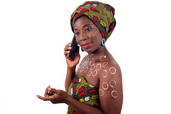 Young African Woman Standing Loincloth Studio Communicating Mobile Phone While — Stock Photo, Image