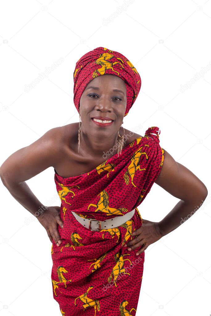 Beautiful African woman wearing a traditional clothes, looks at the camera and smiles, isolated on white background