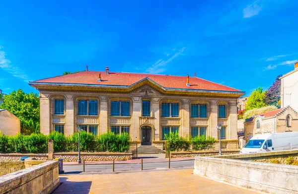 Facades of houses in the old center of Montpellier, Franc